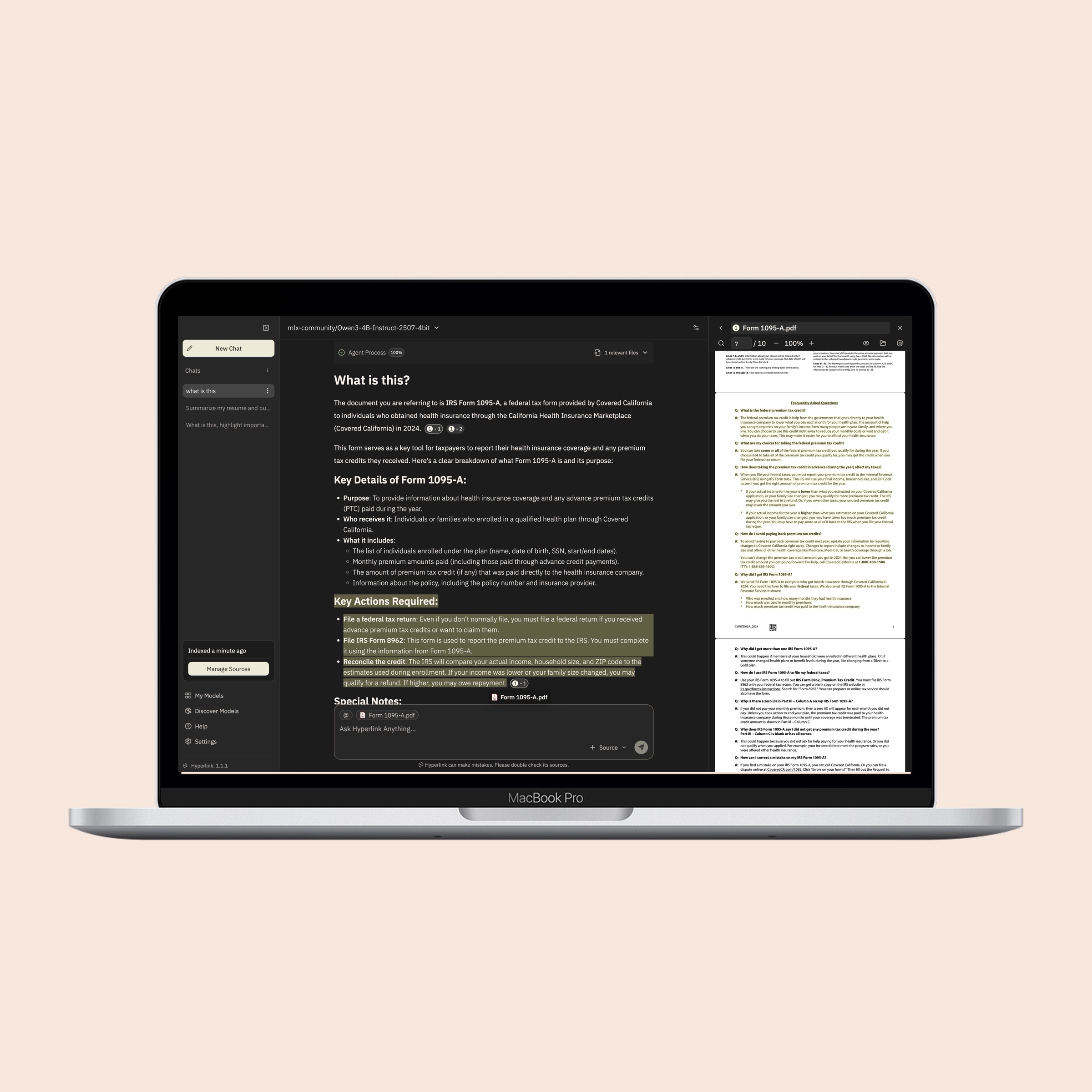 Hyperlink app in dark mode on a laptop, on a soft coral background