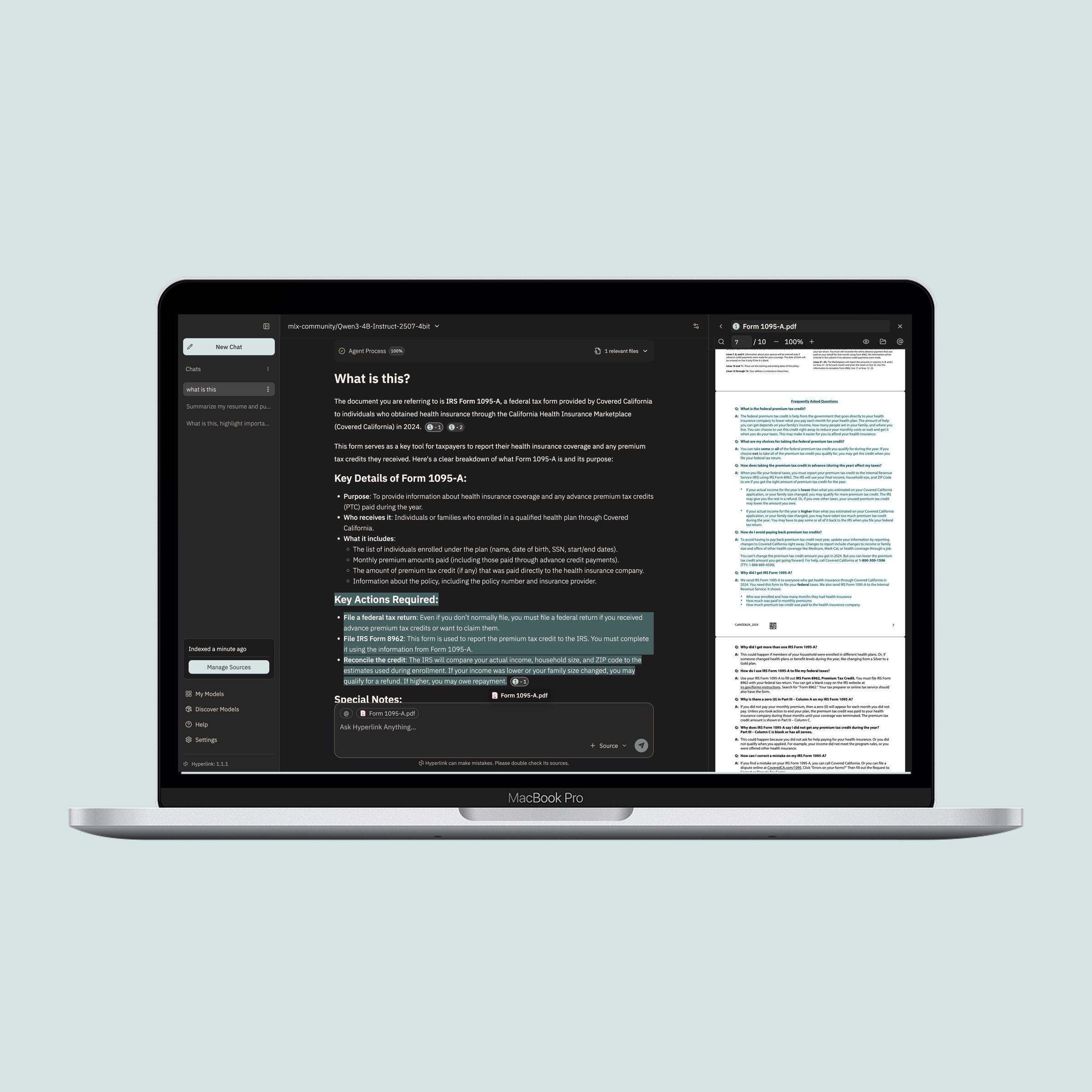 Hyperlink app in dark mode on a laptop, on a soft mint background