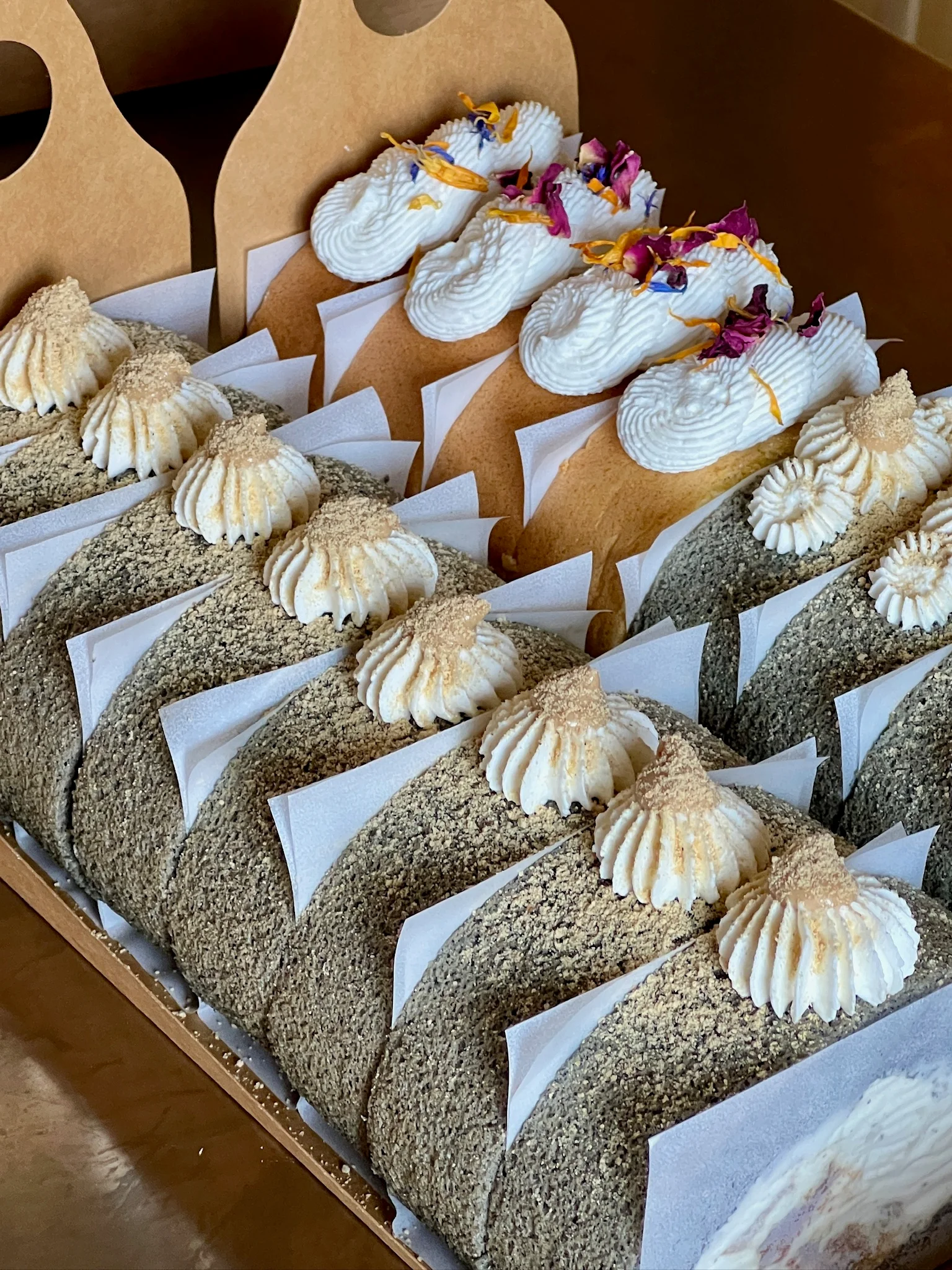 Rows of individually boxed desserts