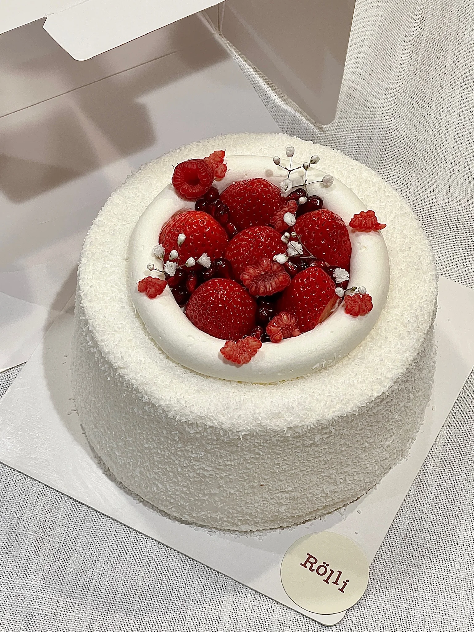 White cake topped with strawberries