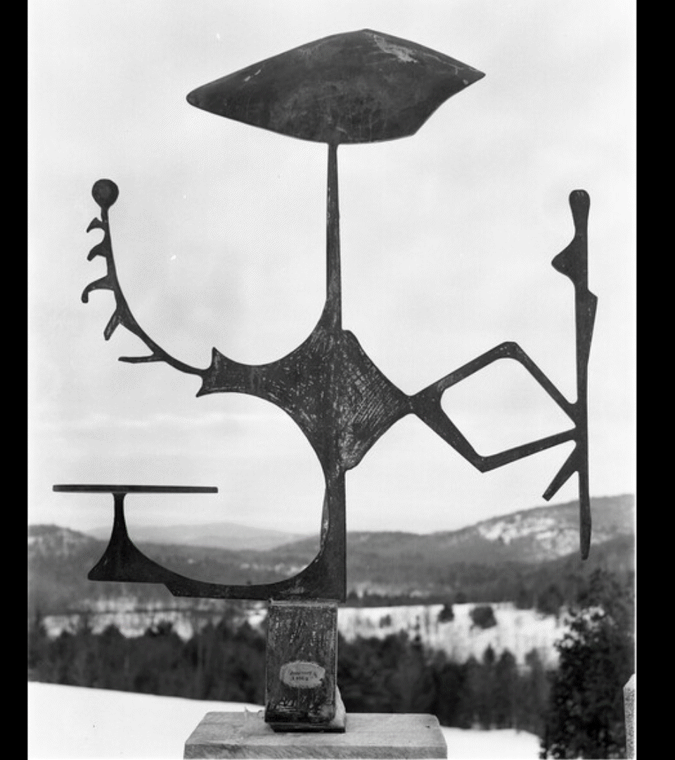 Animated black-and-white photo of a David Smith steel sculpture, with letterforms traced from its shapes